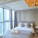 Uptown Parksuites BGC Cosy Hotel Vibe Flat near St Lukes, Uptown Mall, Mitsukoshi and Grand Hyatt, Manila - Fotografie 1