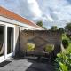 Holiday home in Nes with swimming pool