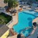 Shared Resort-Style Pool Playground Patio w Bar Tidal Times by AvantStay, Port Aransas - Photo 1