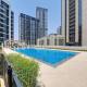 Vacationer l Chic 2 Bedroom l Prime Location in Creek Harbour l Pool View, Dubaj - Fotografie 2