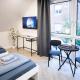 ALFA Stuttgart Doppelzimmer Teeküche Porsche Bosch l Gemeinschaftsbad WIFI SmartTV l Double room with kitchenette and shared bathroom BS21A9, Štutgart (fotografie 2)