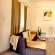 Charming 2BR Apartment with Balcony and Mountain View - Logan's Transient Apartment 2, Baguio (fotografie 5)