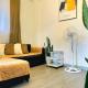 Charming 2BR Apartment with Balcony and Mountain View - Logan's Transient Apartment 2, Baguio (fotografie 4)