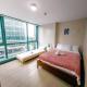 COZI two bedroom family room near Grand Hyatt BGC Manila - Fotografie 1