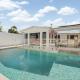 Lush Light Filled Escape with Pool Near Beach
