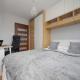 Comfortable Apartment with Air Conditioning and Balcony in the Capital by Noclegi Renters, Варшава - Фото 2