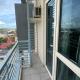 Chic 1BR Getaway with Twin Balcony Charm Mandurriao - Photo 3