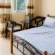 Cozy Guest Room in Kinshasa with Balcony and Partial Air-Conditioning