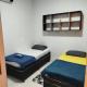 Quarto individual com 2 camas box de solteiro hostel 940, Sinop
