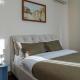 Balcony View in ultracentral Chisinau - Spacious 4 room Living & high end amenities - AC & Bean-Coffee Bar - GrandStay, Chişinău (foto 3)