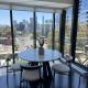 Light-Filled Apartment with City Views, Office & Parking, Melbourne