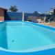 Casa ampla pé na areia a 100 passos do mar com roupa de cama, salão de jogos, churrasqueira e piscina, Saquarema (photo 4)