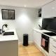 Stylish Condo Apartment with Stunning Rooftop Views & Pool, Gym and Hot Tubs by Peppy Beach Retreats, Мельбурн (фото 7)