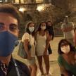 a group of people with masks on their faces
