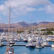 a bunch of boats docked in a harbor