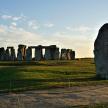 an prehistoric monument with a large rock in a field
