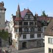 a building with a clock tower in a city