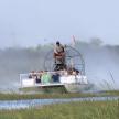 a group of people on a boat in the water