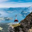 a cable car on the edge of a mountain