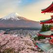 a japanese temple with a mountain in the background