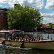a group of people on a boat in the water