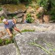 a man standing on top of some rocks