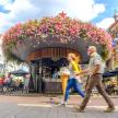 a man and a woman walking down a street