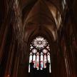 a large cathedral with a large window in it