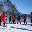 a group of people on skis in the snow