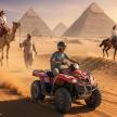 a man riding a quad bike in front of the pyramids