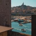 a view of a harbor with boats in the water