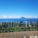 a sign that reads guumbopol island in the ocean