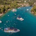 an aerial view of a harbor with boats in the water