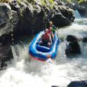 two people in a raft in a river