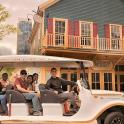 a group of people riding in a golf cart