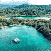 a boat in the middle of a large body of water