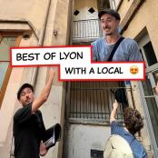 a man holding a sign that reads best of lynonym with a local