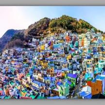 a large group of buildings on a mountain