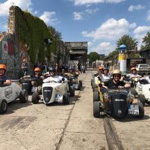 a group of people riding in side cars