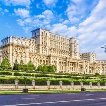 a large building with a street in front of it