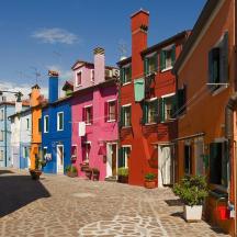 a group of colorful buildings on a street