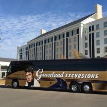a bus is parked in front of a building