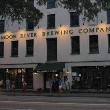 a building with a sign that reads moon river brewing company