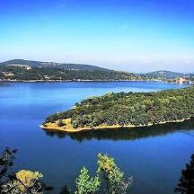 an island in the middle of a large lake