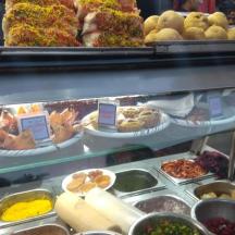 a display case with many different types of food