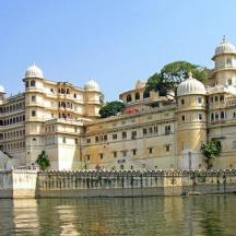 a large building next to a body of water