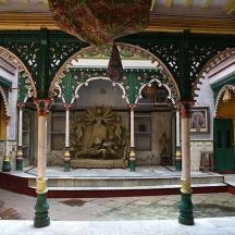 a building with a statue in the middle of a room