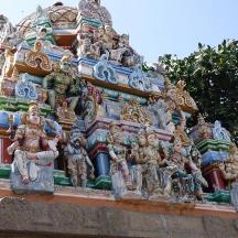a group of figurines on top of a building