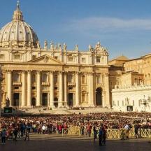 a large crowd of people in front of a large building