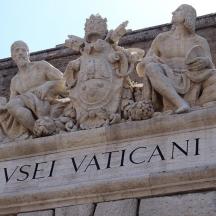 a statue on the side of a building